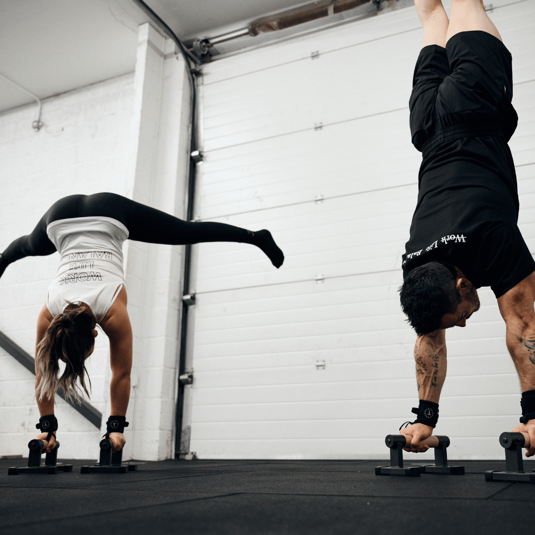 Gymnasts performing handstands
