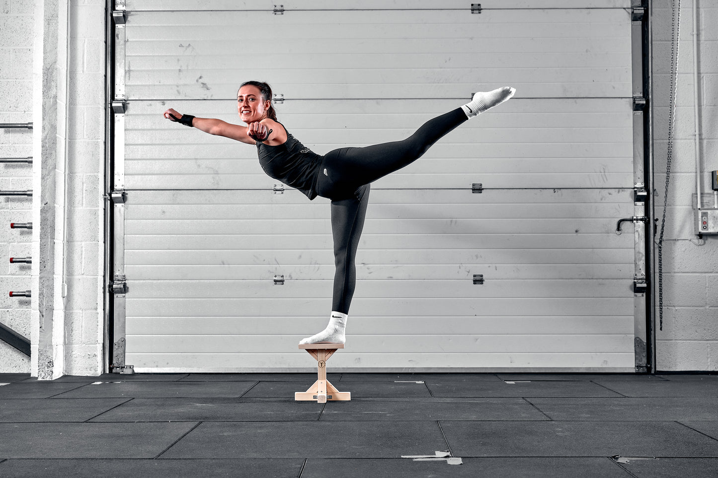 cheerleader on stunt stand