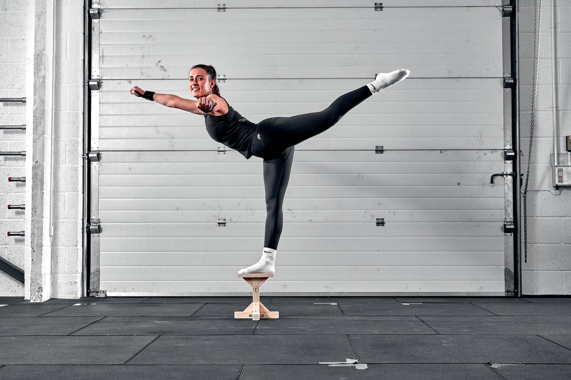cheerleader on stunt stand