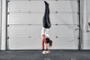 Gymnast performing handstand on blocks
