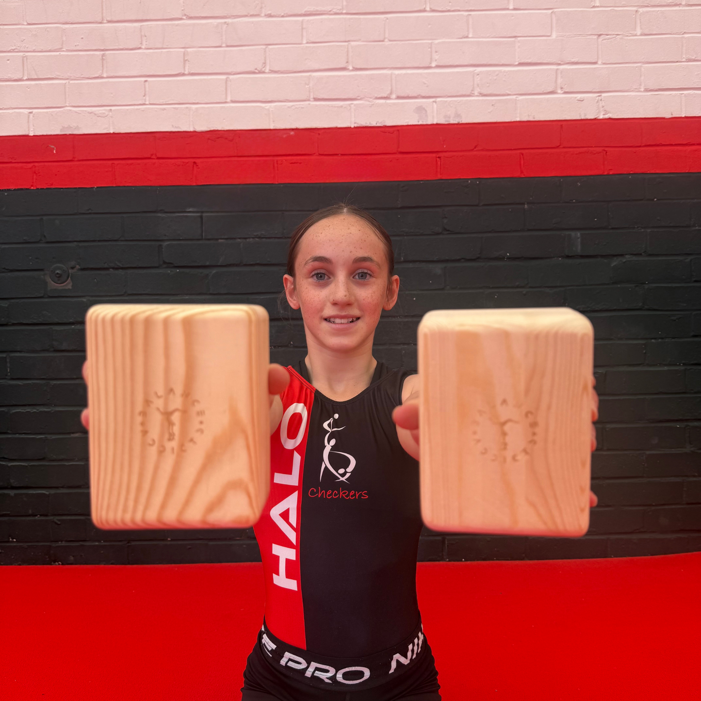 wooden handstand blocks by balance addicts held by gymnast